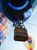 Ed Word riding on CapEd's Read to Rise hot air balloon.