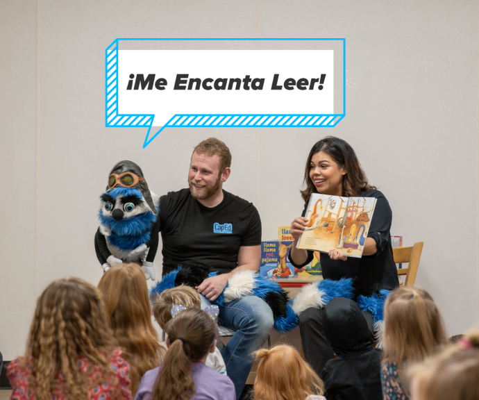 Ed Word reading at the Children's Museum of Idaho in multiple languages, Spanish and English.