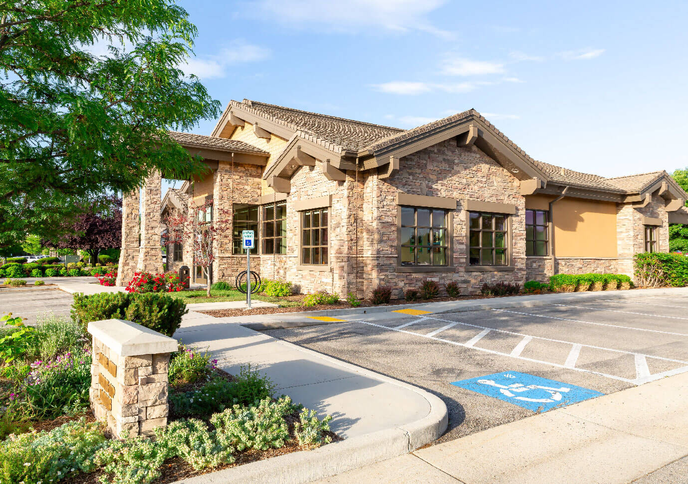 CapEd's Eagle location as seen from the sidewalk and handicapped parking.