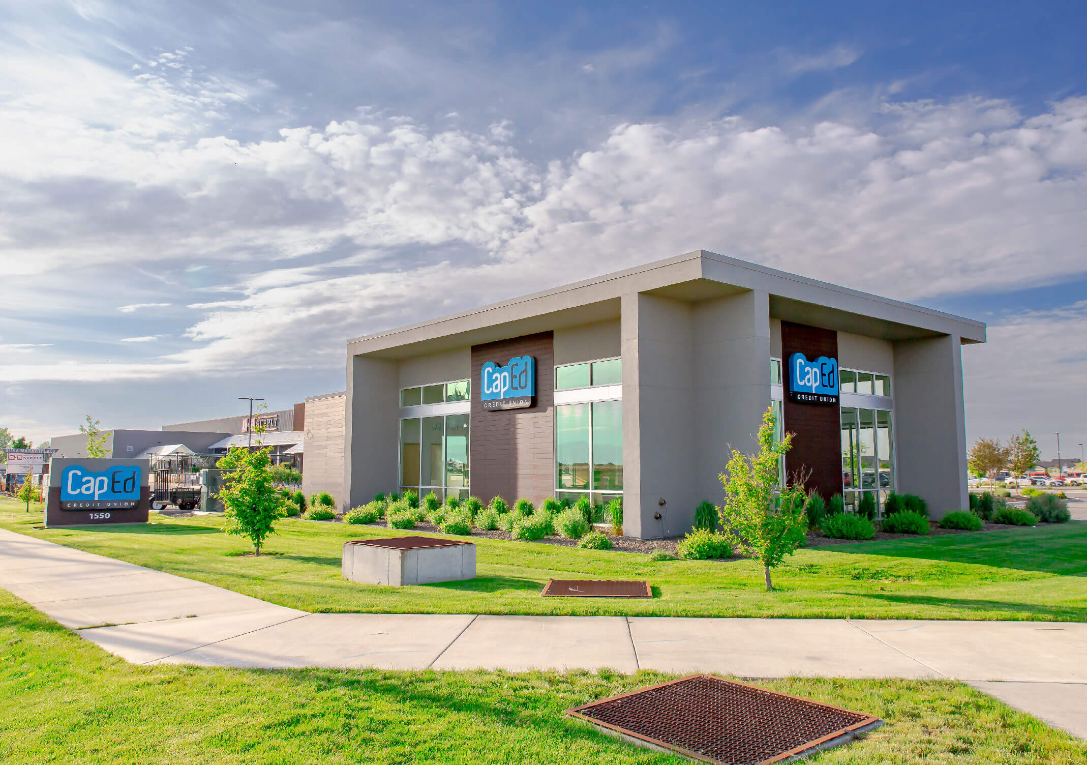 CapEd Kuna branch building seen from the sidewalk walway.