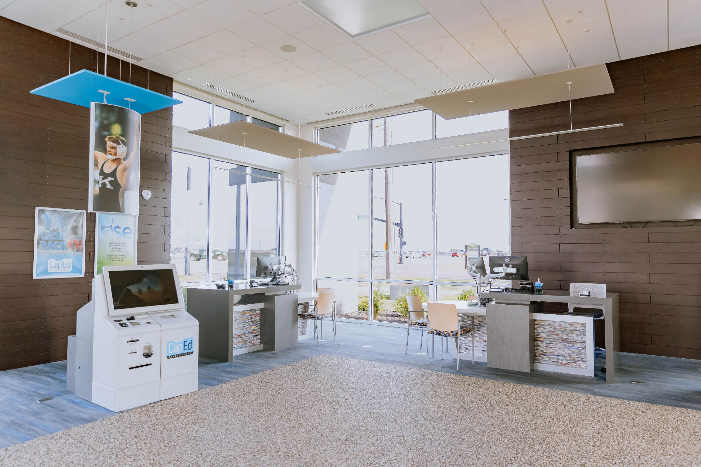 CapEd Kuna location kiosks and coin machine.