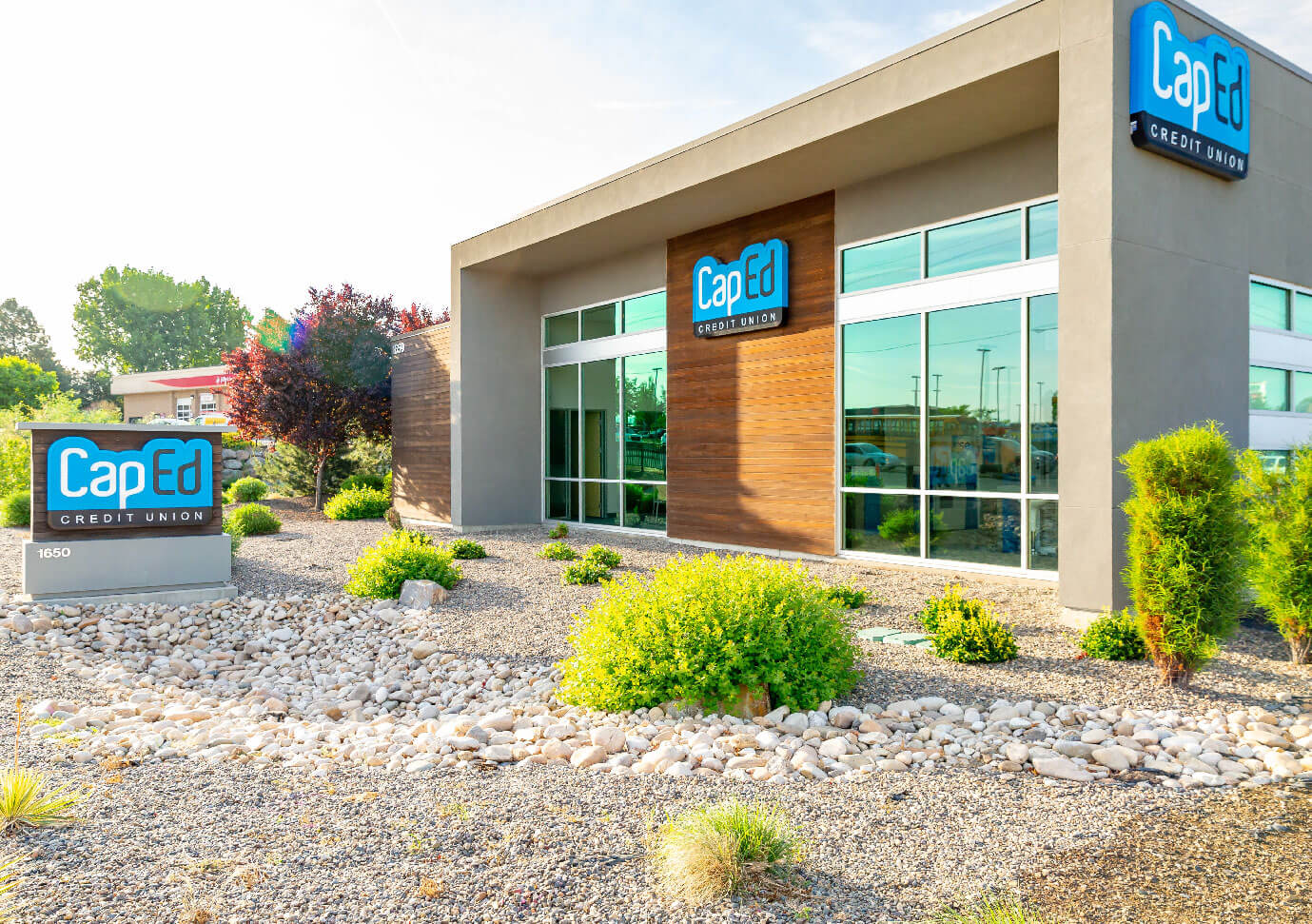 CapEd's South Meridian location landscaping and large windows.